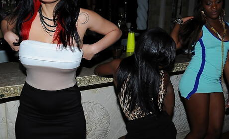 Sexy women Nikki Delano and Mandy Armani sucking on dick in the night club