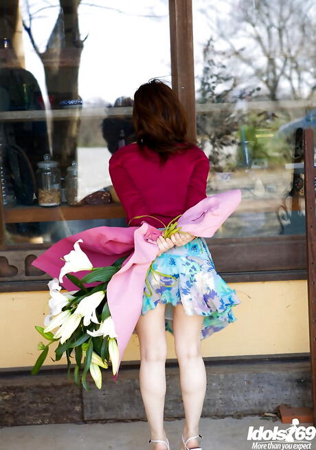 Shapely japanese redhead teen Maiko Kazano reveals tiny tits and sexy butt outdoor