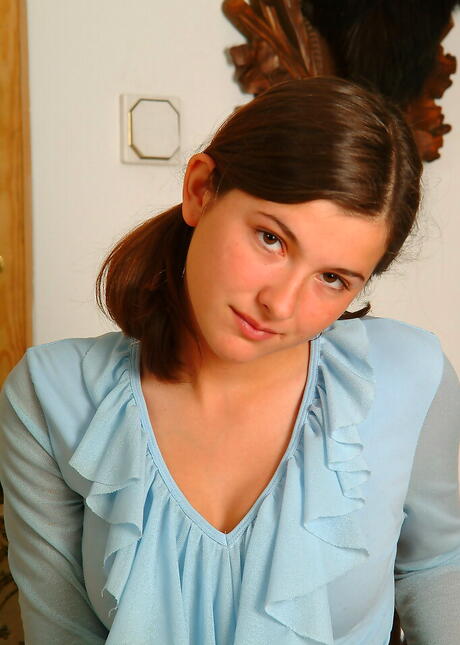 Shapely dark hair young Karina bares big boobies and masturbates 